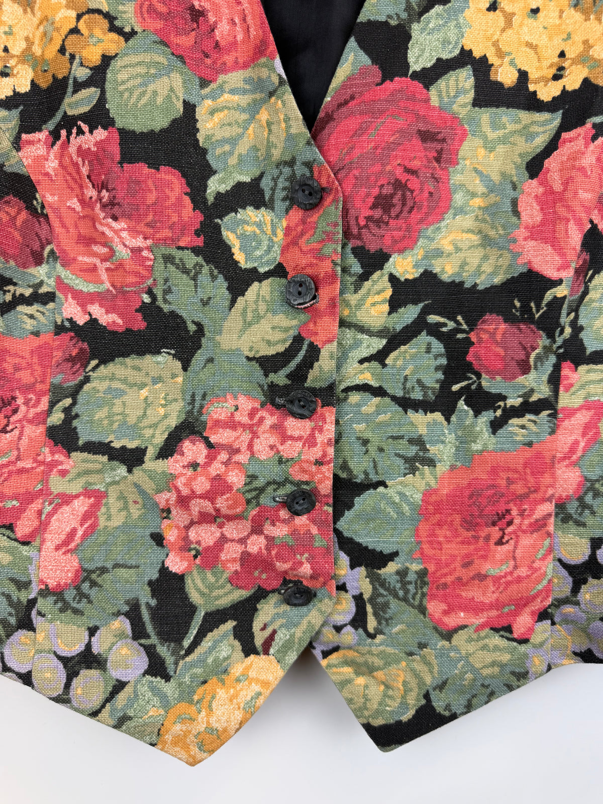 Gilet vintage floreale con fondo a punta