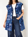 Gilet vintage lungo in pile blu con fantasia astratta