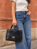 Borsa vintage nera con dettagli dorati